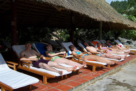 Travelers sun-bathing at Hot Mineral Spring Centre in Nha Trang