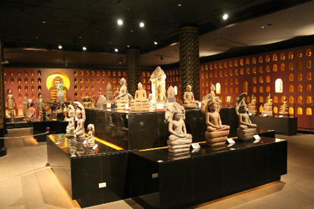 Carved statues in Angkor National Museum