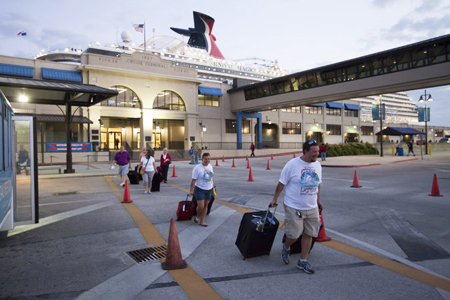 Passengers left the Carnival cruise ship on Sunday morning