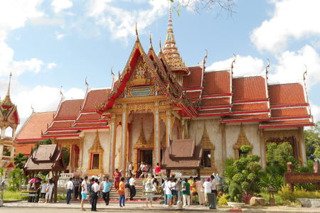 Tourists visiting Chalong Temple