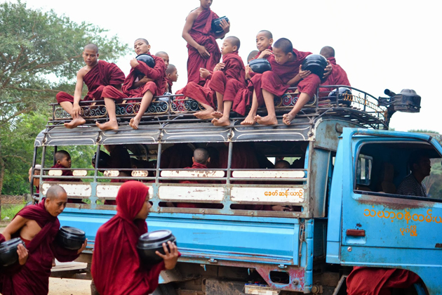Myanmar monks on a truck in the morning