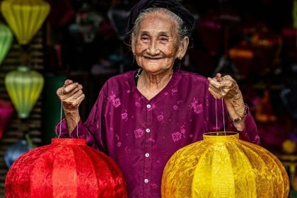 Elderly artisan making lanterns in Hoi An