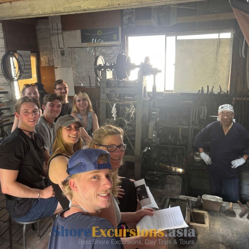 Travelers at Japanese blacksmith workshop -Shore Excursions Asia