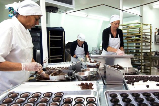Chef preparing chocolates at Makana Chocolate Factory