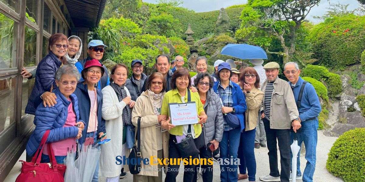 Guests enjoying Kagoshima shore excursions in a Japanese garden