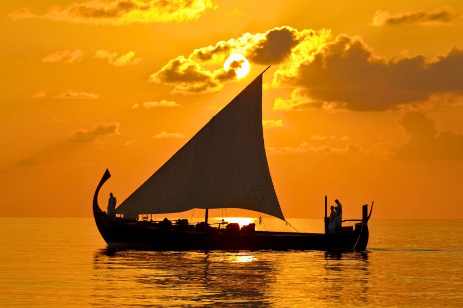 Sunset cruise in the Maldives at golden hour
