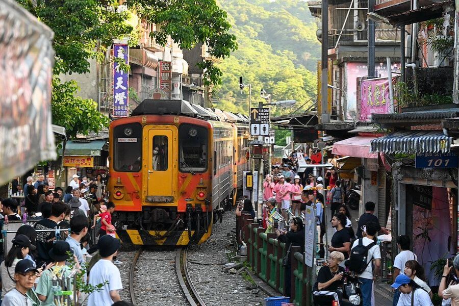 Train passing through Shifen Old Street Train passing through Shifen Old Street
