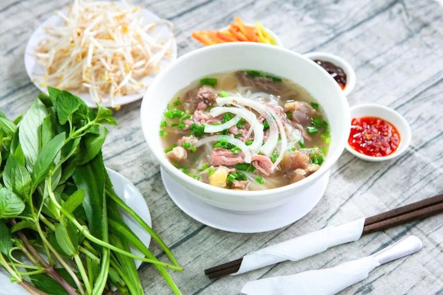 Traditional Vietnamese pho enjoyed on a Ho Chi Minh City day trip