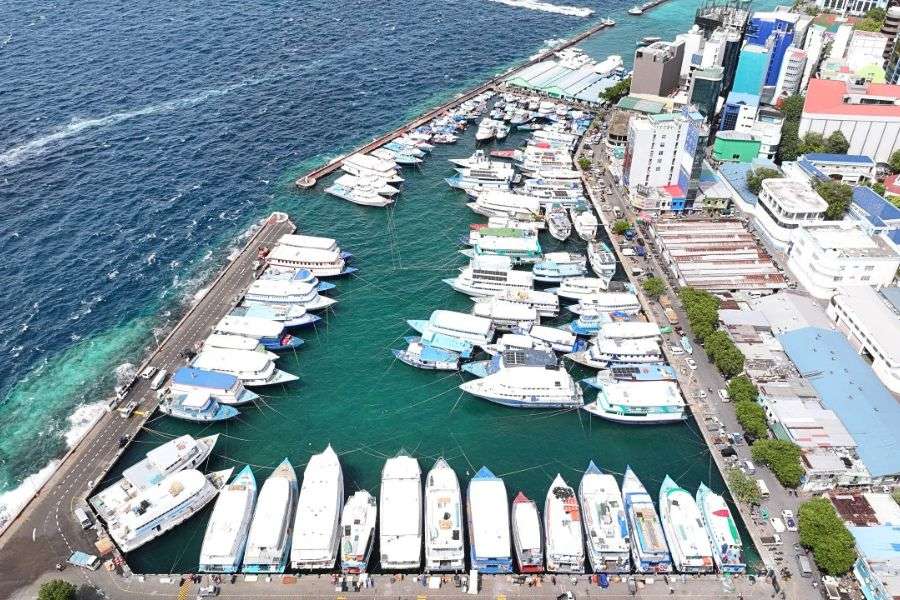 Boats moored along the waterfront in Malé, Maldives
