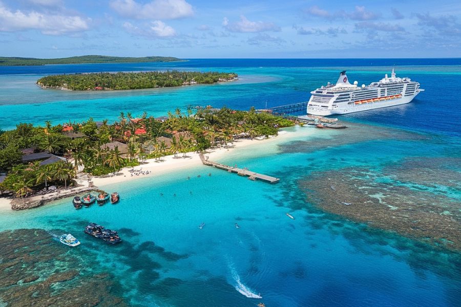 Cruise ship near a tropical resort island in the Maldives