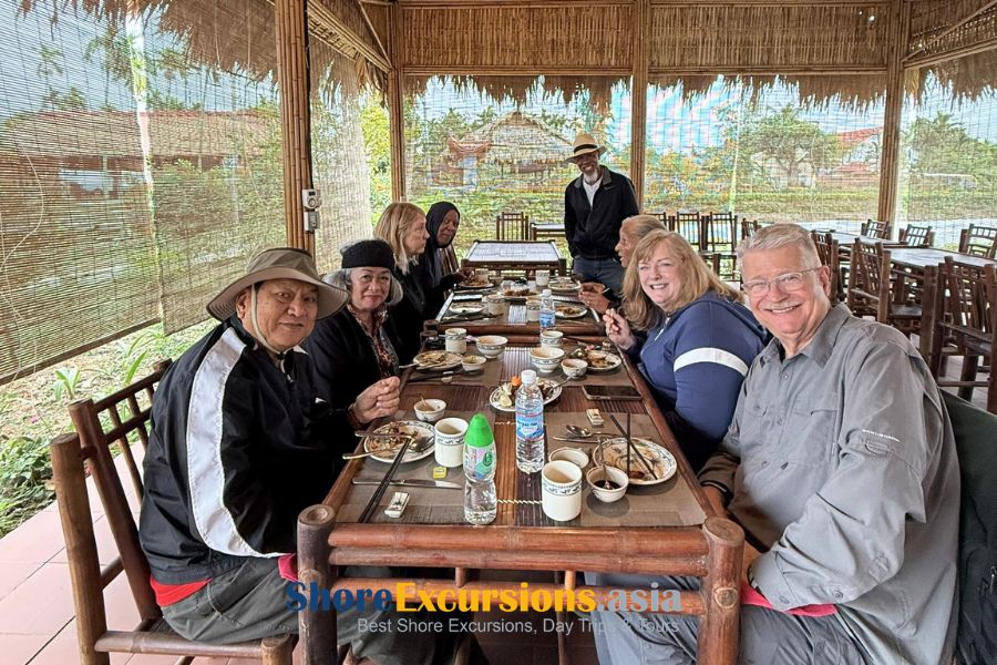 Guests enjoying traditional Vietnamese food in Halong