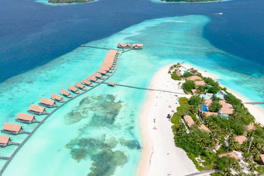 Maldives island with overwater villas