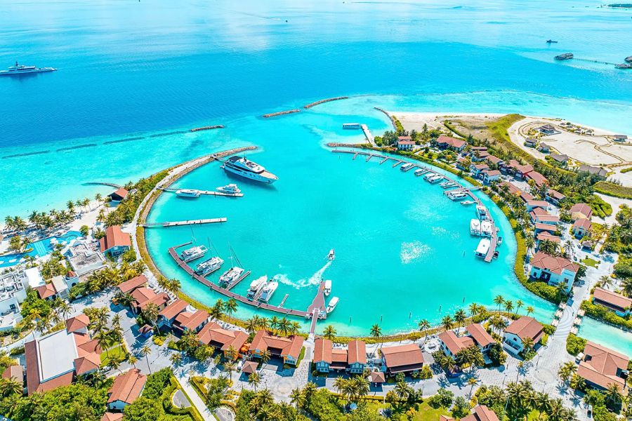 Maldives resort lagoon under clear dry-season weather