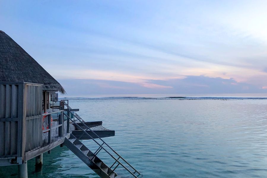 Overwater villa facing a calm Maldives lagoon in November