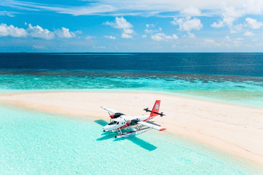 Seaplane beside a Maldives sandbank