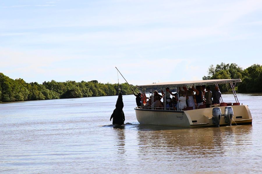 Small open-air crocodile cruise boat on the Adelaide River