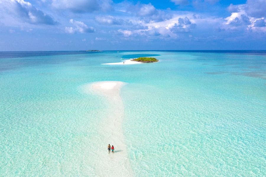 Walking on a Maldives sandbank