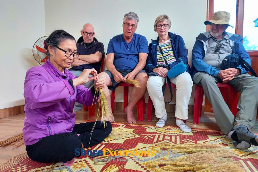 Cruise guests visiting a traditional village