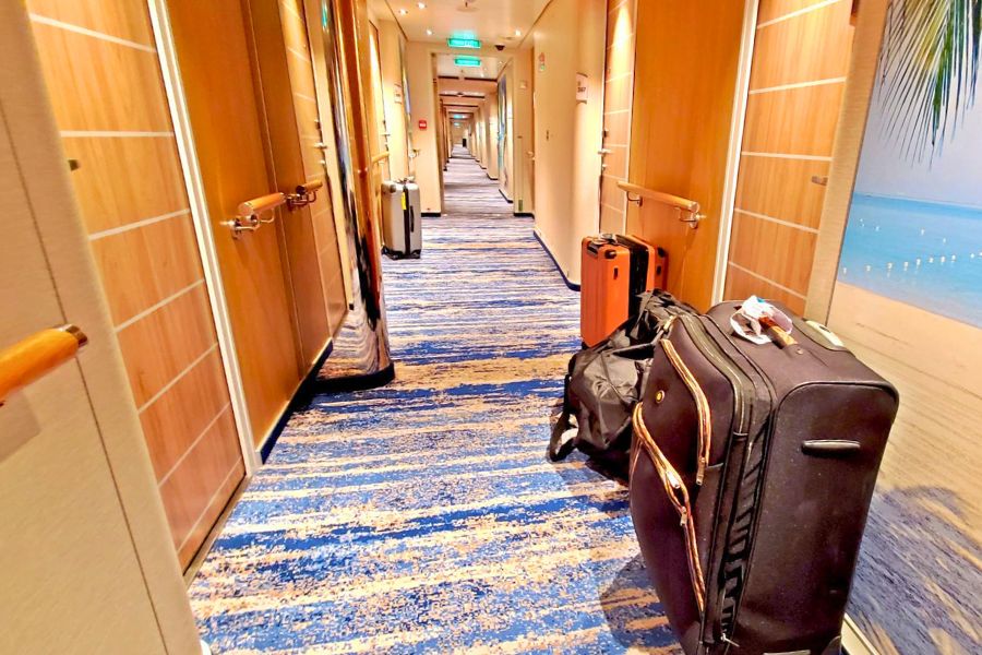 Cruise luggage outside a hotel room