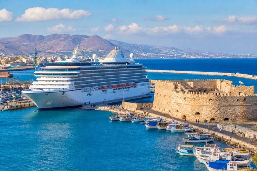 Cruise ship docked near city