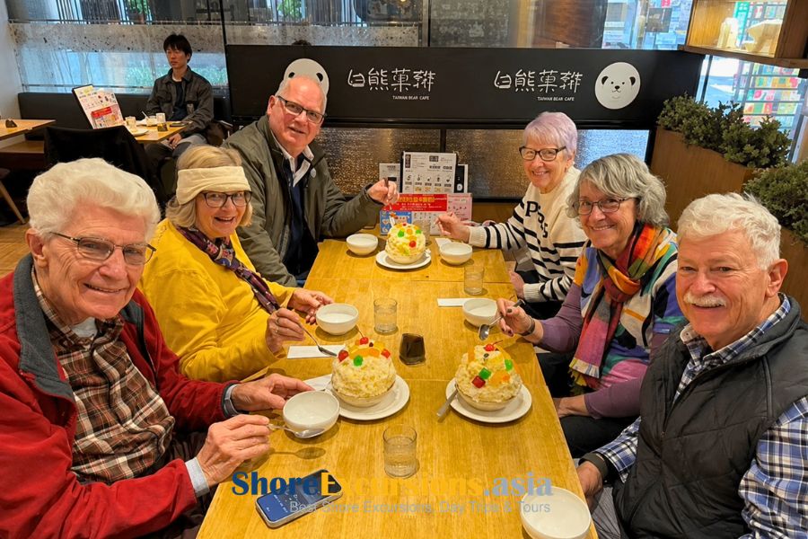 Guests enjoying a local meal