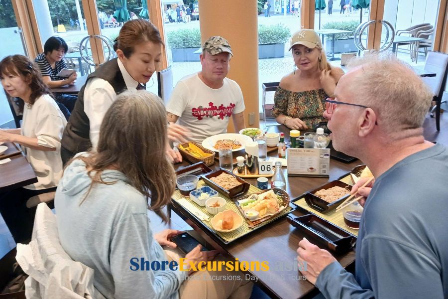 Cruise guests enjoying a local meal during a post cruise tour