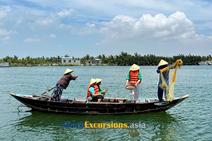 Local fishing boat on the river in Hoi An